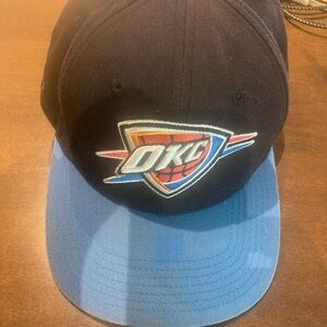 OKC NBA ball cap.